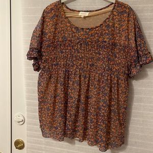 Like New Beautiful Anthropologie Delta med/Lg Floral top with top ruffles